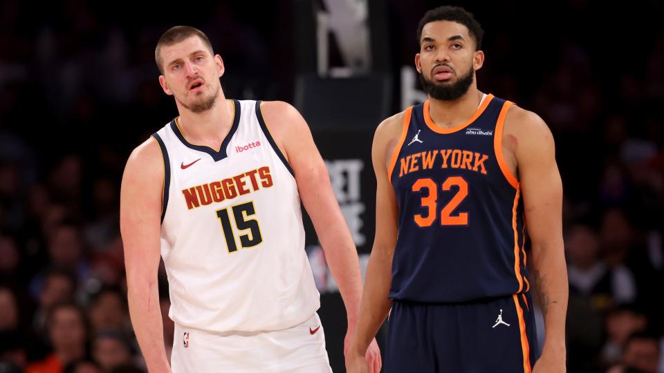Jan 29, 2025; New York, New York, USA; Denver Nuggets center Nikola Jokic (15) and New York Knicks center Karl-Anthony Towns (32) react during the fourth quarter at Madison Square Garden.
