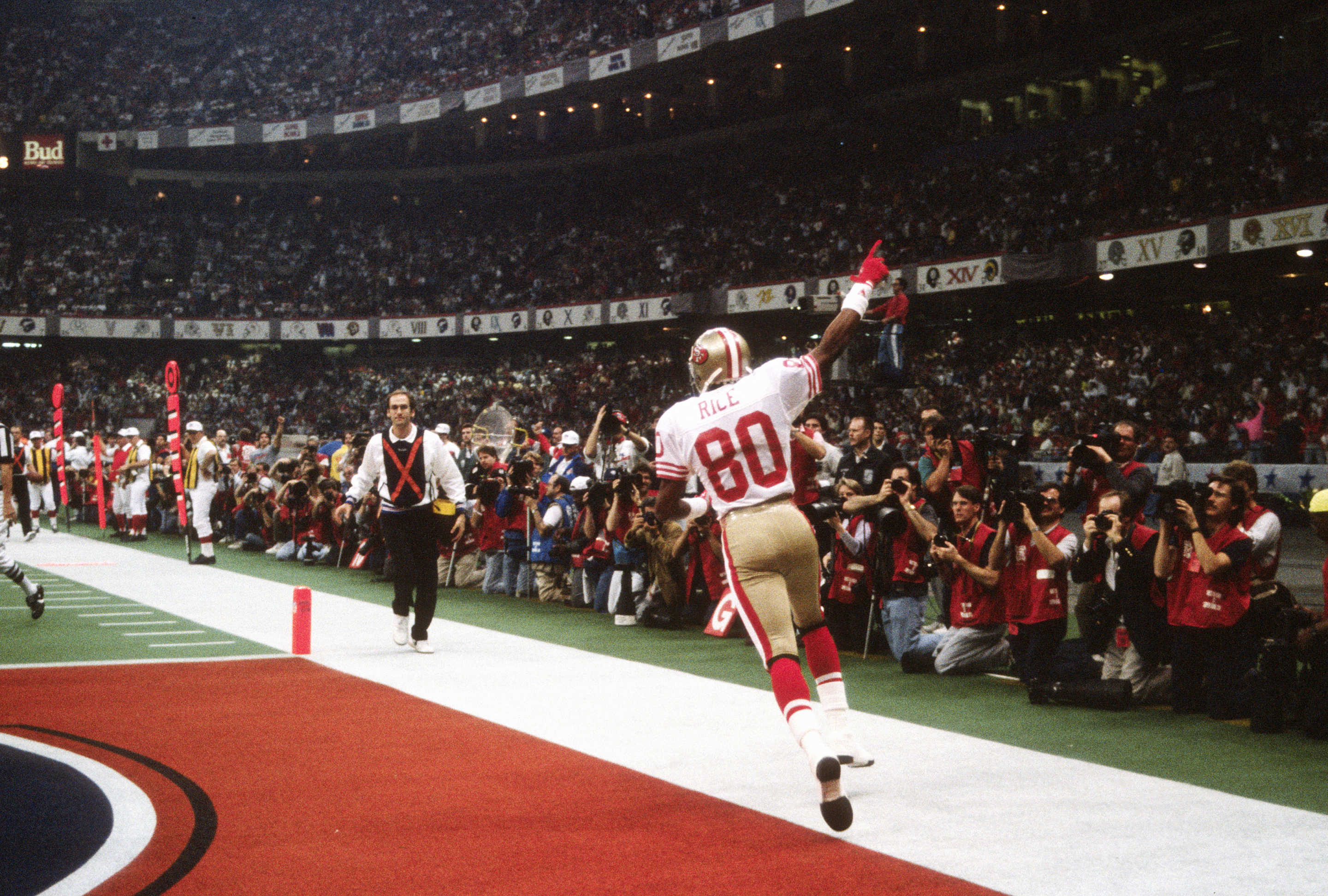 NEW ORLEANS, LA - JANUARY 28: Jerry Rice #80 of the San Francisco 49ers celebrates after he scored a touchdown against the Denver Broncos during Super Bowl XXIV on January 28, 1990 at the Super Dome in New Orleans, LA. The 49ers won the Super Bowl LV-10. (Photo by Focus on Sport/Getty Images)