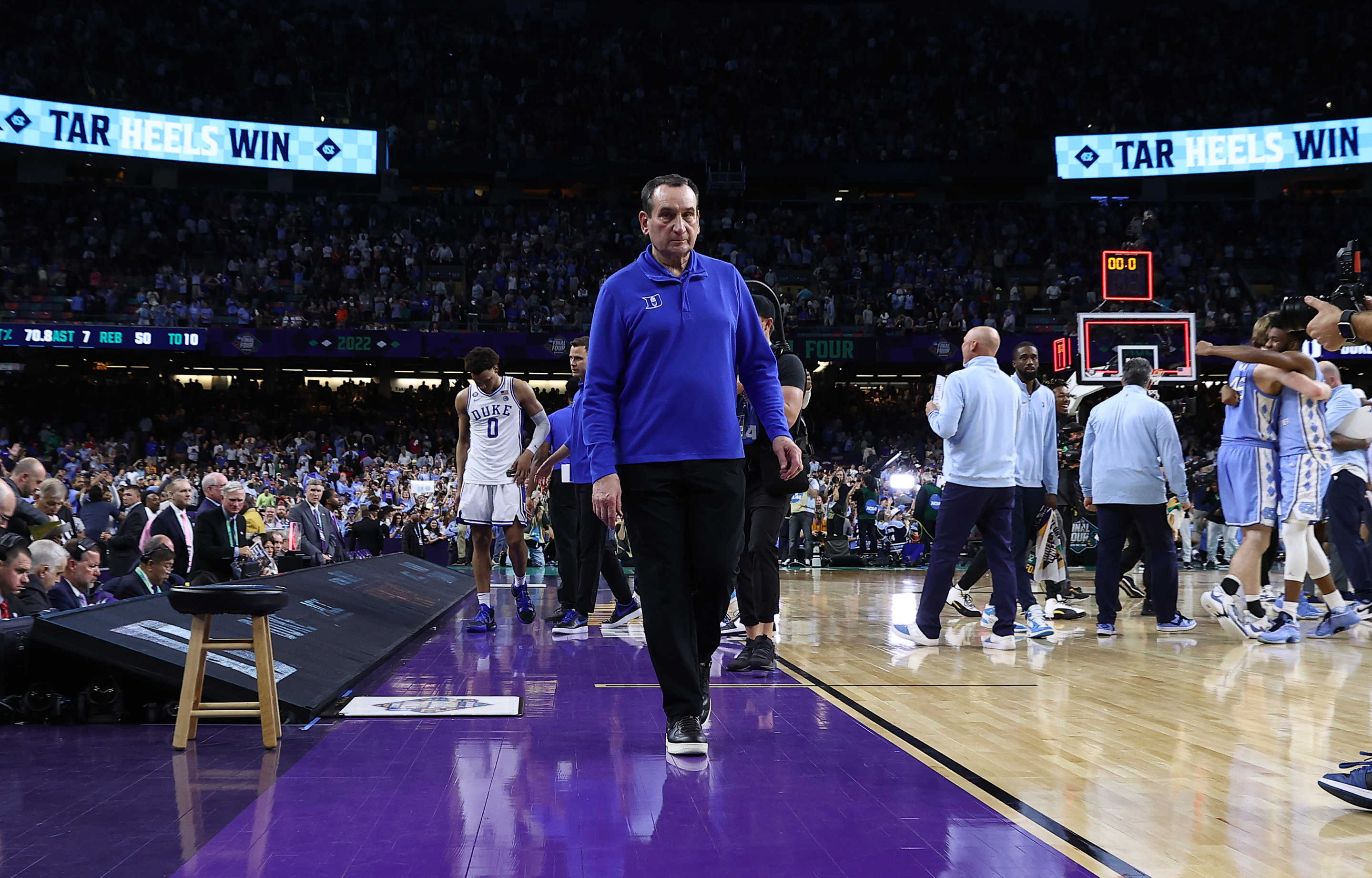 NEW ORLEANS, LOUISIANA - APRIL 02: Head coach Mike Krzyzewski of the Duke Blue Devils walks off the court after losing to the North Carolina Tar Heels 81-77 in the 2022 NCAA Men's Basketball Tournament Final Four semifinal at Caesars Superdome on April 02, 2022 in New Orleans, Louisiana. (Photo by Jamie Squire/Getty Images)