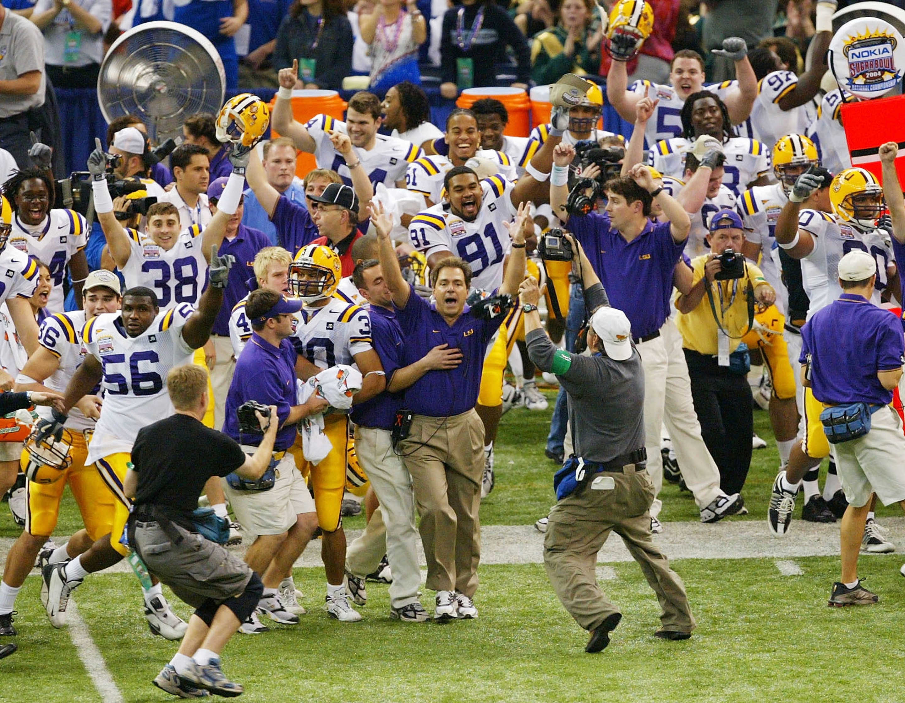 NEW ORLEANS - JANUARY 4: Head coach Nick Saban of LSU celebrates after defeating Oklahoma 21-14 to win the National Championship at the Nokia Sugar Bowl on January 4, 2004 at the Louisiana Superdome in New Orleans, Louisiana. (Photo by Jamie Squire/Getty Images)