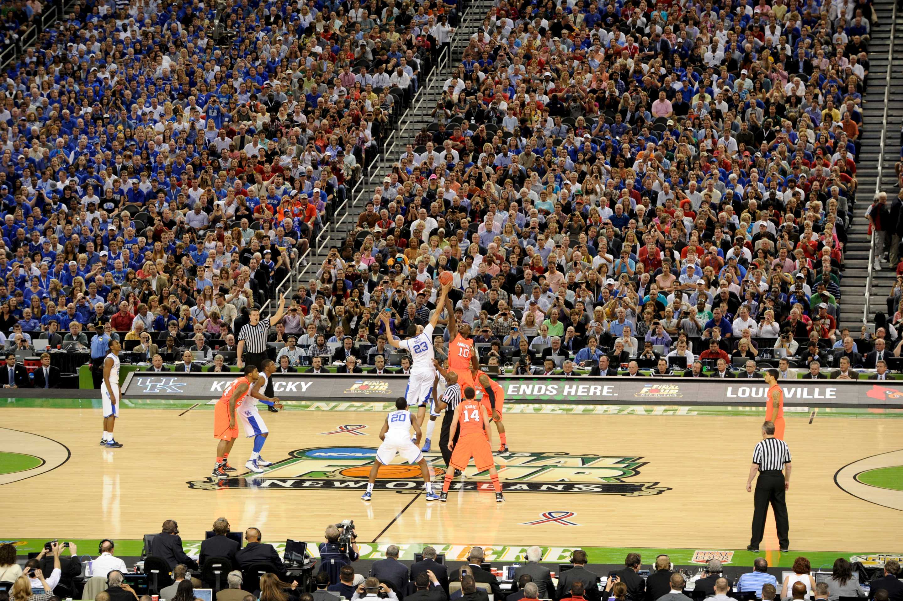 31 MAR 2012: Anthony Davis (23) of the University of Kentucky goes up for the tipoff against Gorgui Dieng (10) University of Louisville during the Semifinal Game of the 2012 NCAA Photos via Getty Images Men's Division I Basketball Championship Final Four held at the Mercedes-Benz Superdome hosted by Tulane University in New Orleans, LA. Kentucky defeated Louisville 69-61 to advance to the national final. Brett Wilhelm/ NCAA Photos via Getty Images