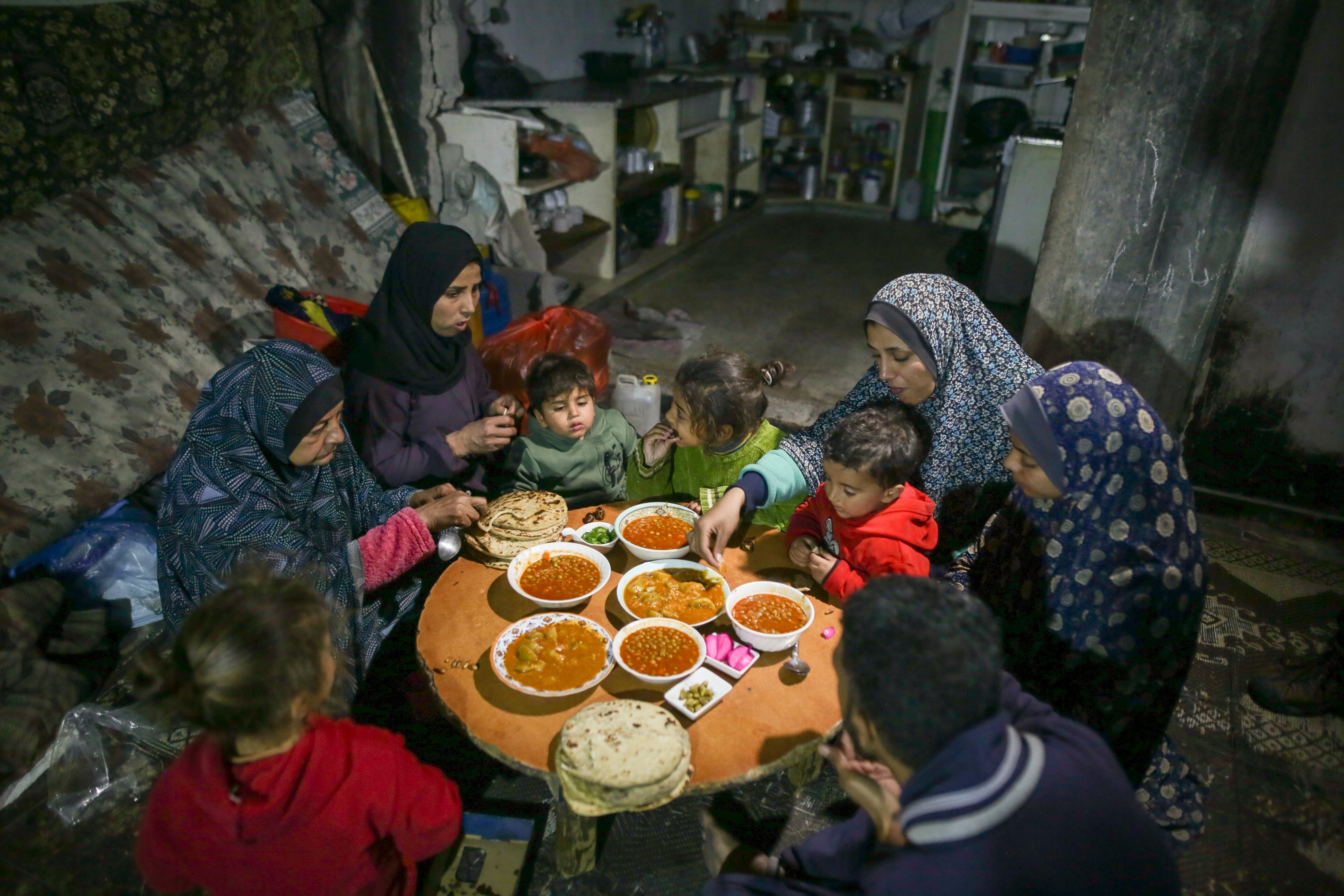 A Muslim family shares a meal after a day of fasting